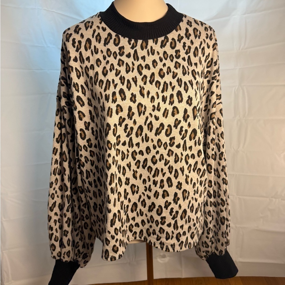 Glam Chic Leopard Print Blouse with Black Accents